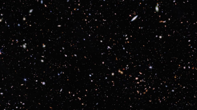 Image of a field of stars and galaxies.